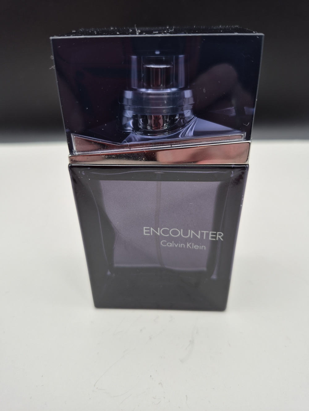 Calvin Klein Encounter Dark Purple Bottle with Silver Accent